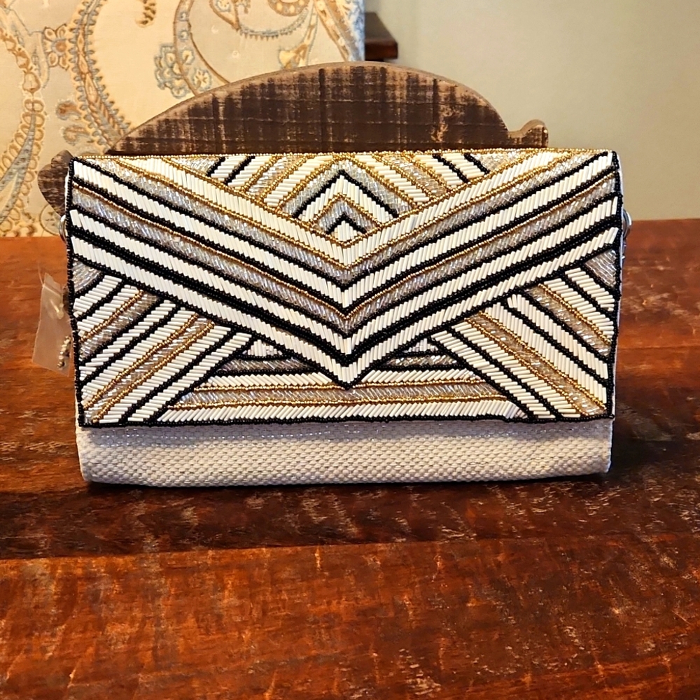 America & Beyond beaded cluth with detachable silver chain strap